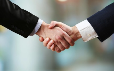 Two people shaking hands